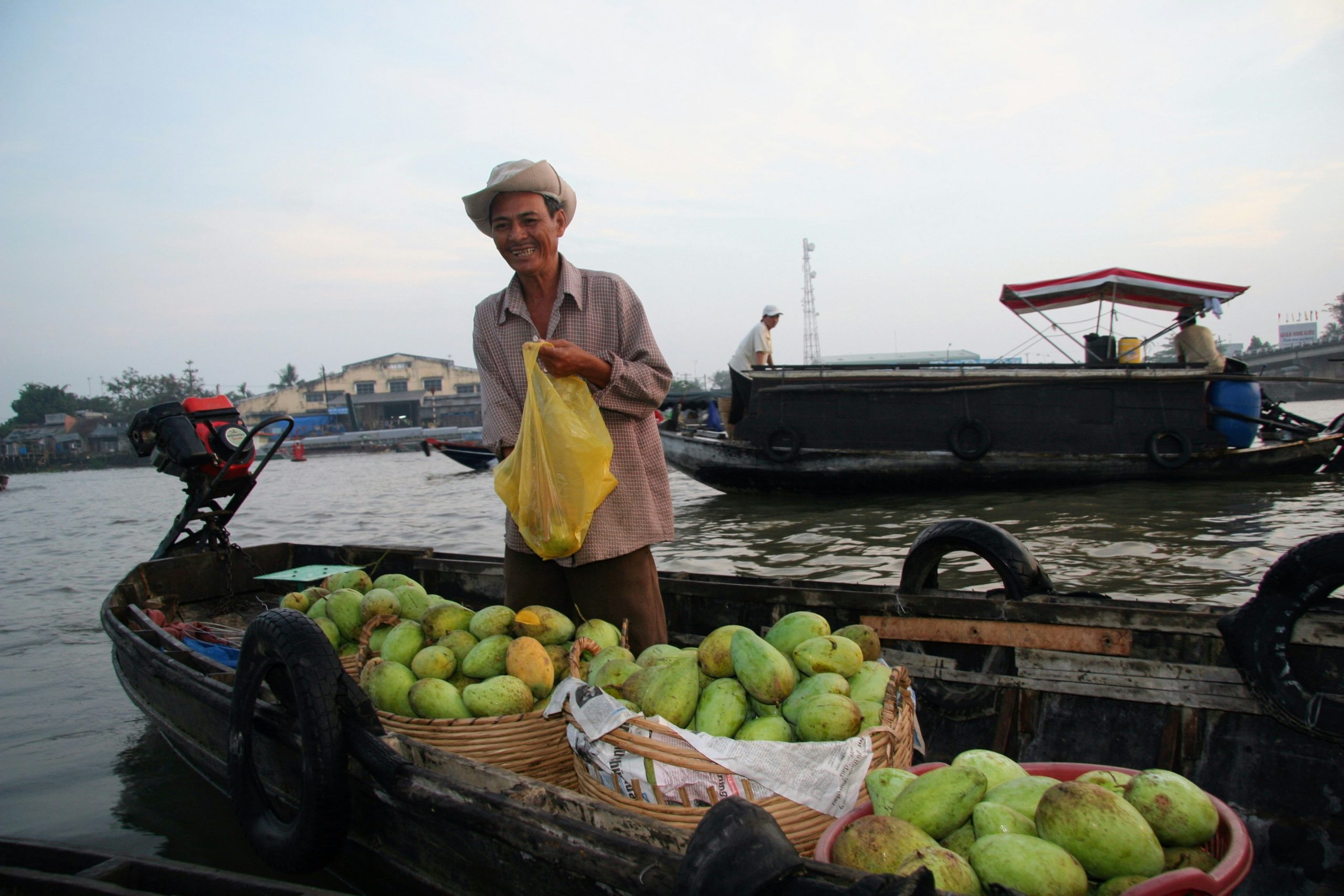 Local boatman on the Mekong Delta, Vietnam