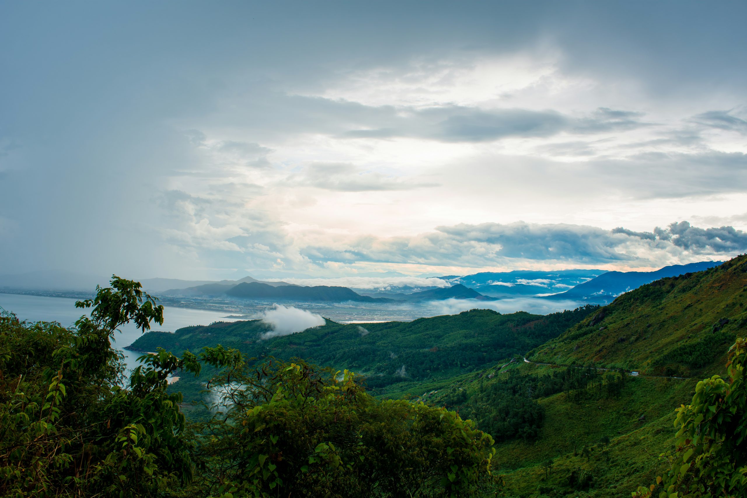 Scenic Hai Van Pass winding through mountains along the coast near Da Nang, Vietnam