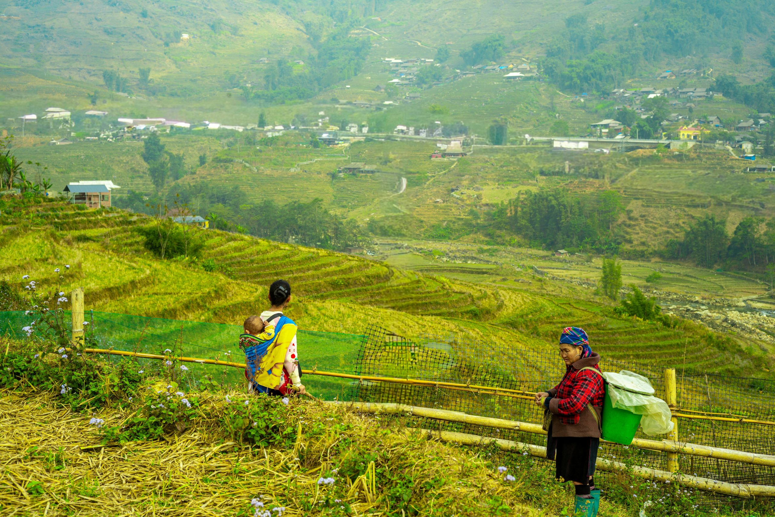 Farmer family working in a field in Sapa, northern Vietnam