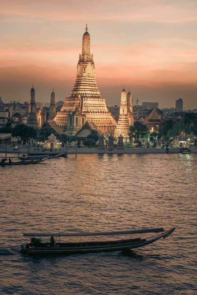 Wat Arun temple overlooking the Chao Phraya River in Bangkok, Thailand